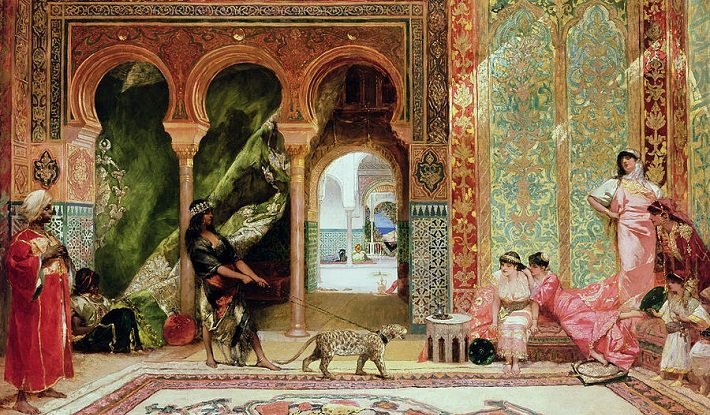 Eight people dressed in silk and gold jewelry lounge in front of the backdrop of opulent palace walls. One figure in the center is walking a leopard on a leash.